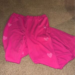 Plus size hot pink bell bottoms with heart cutout detail NWT